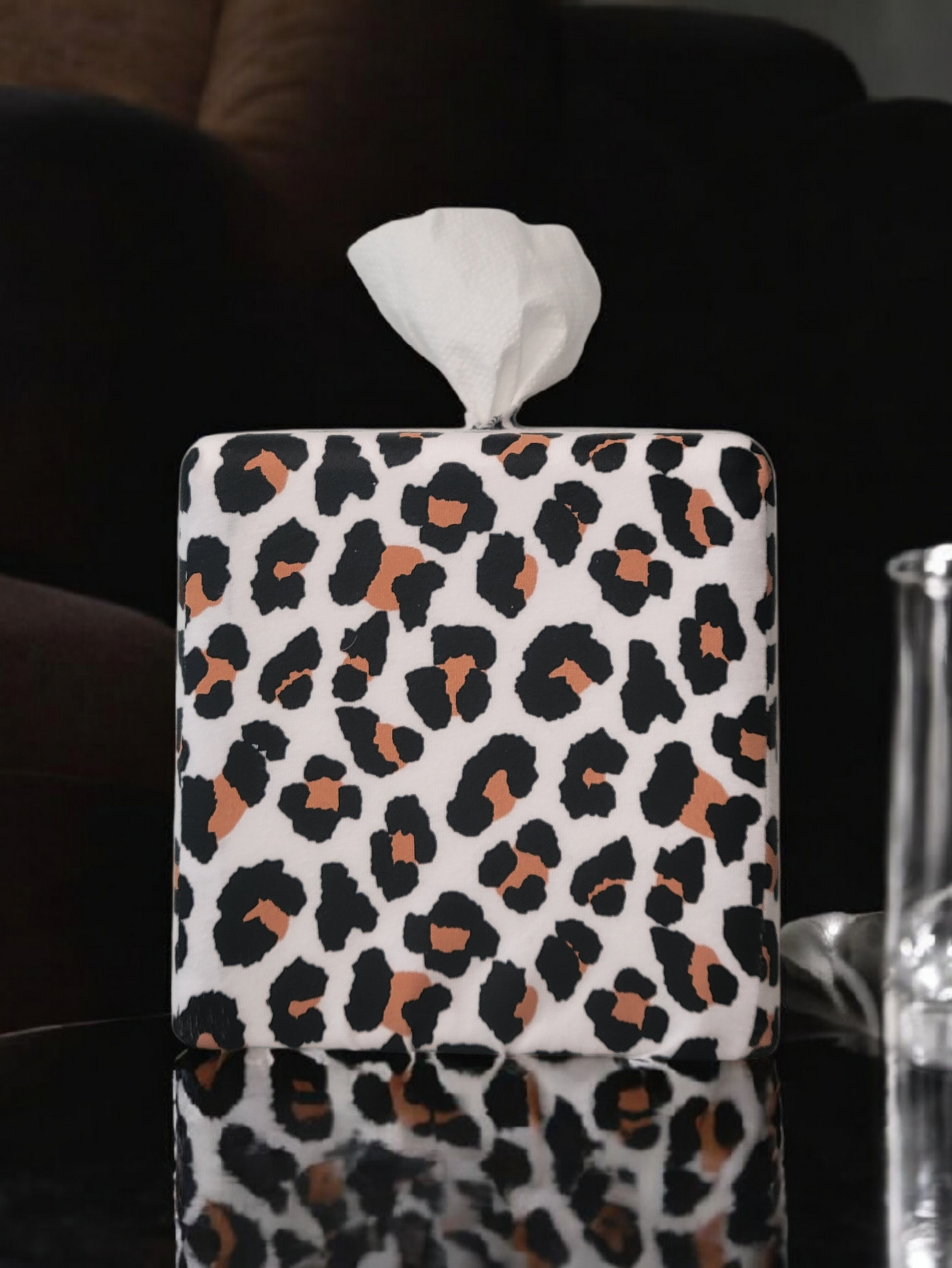 Modern Leopard AchooBox on glass table with dark background