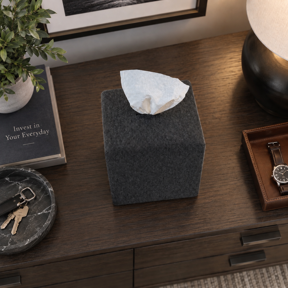 charcoal achoobox aerial view on dark console table