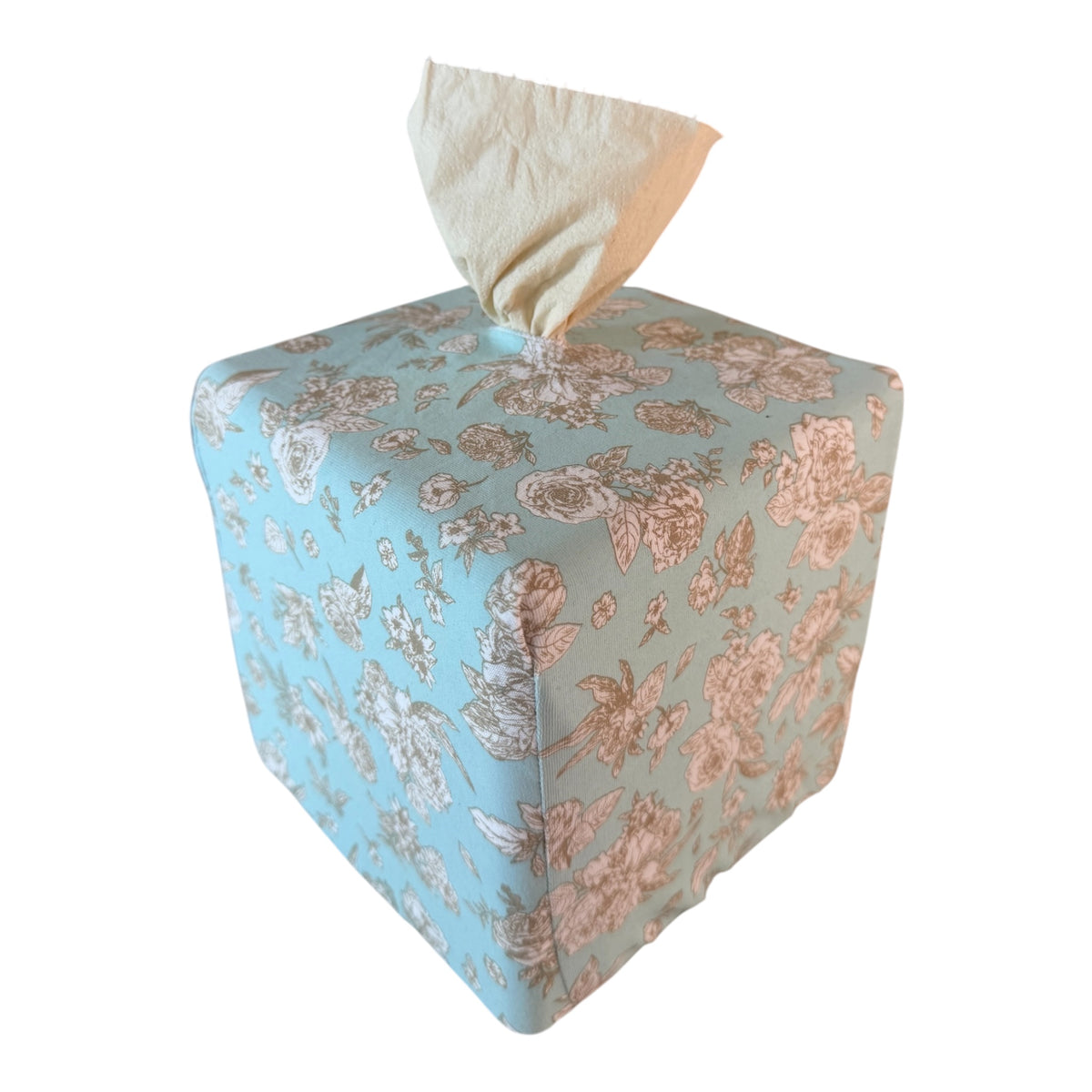 Aerial view of surf spray garden toile achoobox. top and corner view of beautiful designer tissue dispenser. Bamboo toilet paper inside the box dispenses through top opening.