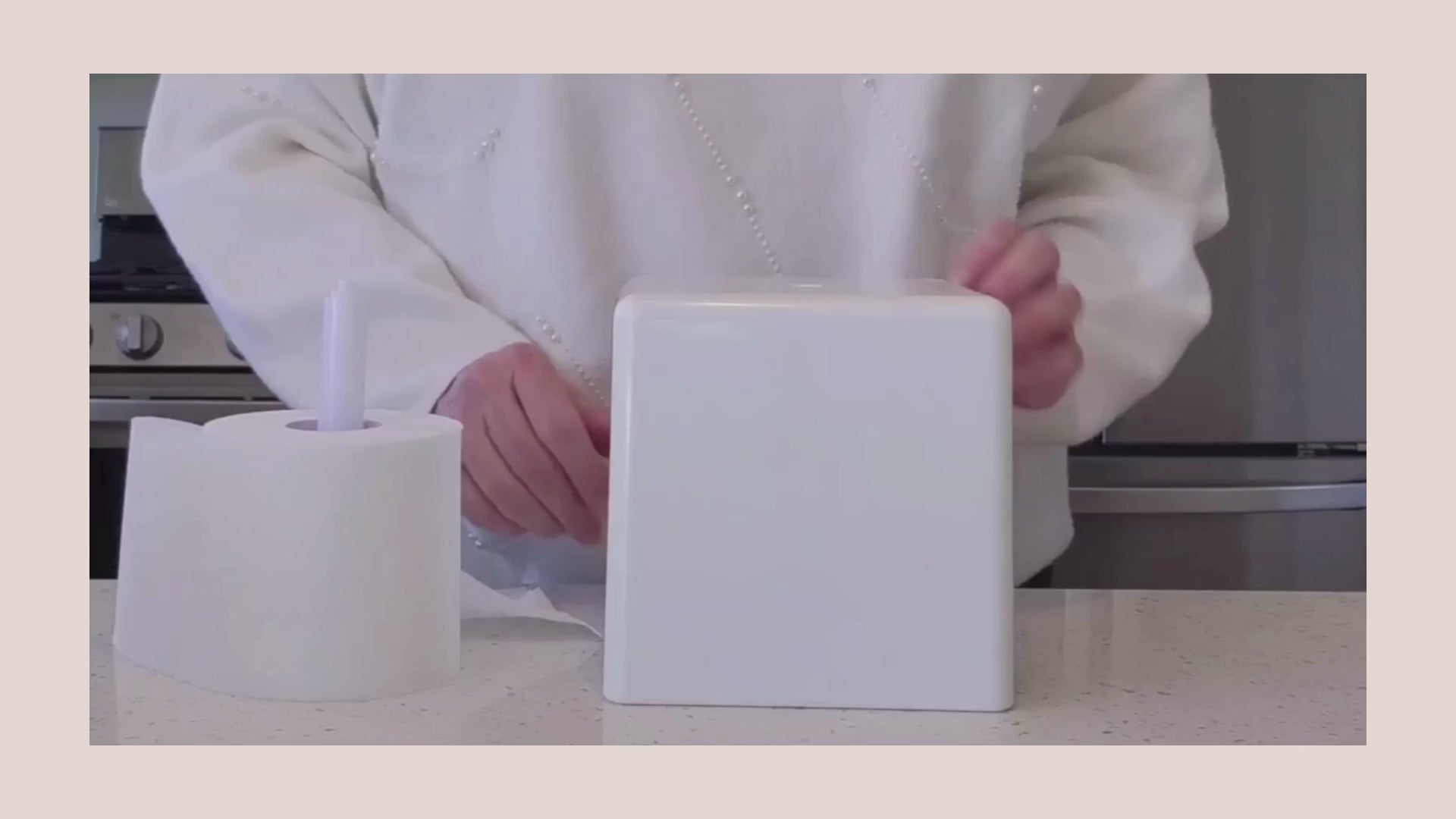 Load video: Loading and dispensing tissue from AchooBox